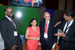 General manager of Jamaica National Building Society Earl Jarrett (left) could not help but laugh while Richard Pandohie (right), CEO of Seprod, makes a point during the Inter-American Development Bank (IDB) Foromic Conference at the Montego Bay Convention Centre last Monday. Also participating in the discussion are Chief information officer at GraceKennedy Simon Roberts (second right), and CEO of Honey Bun Bakery Michelle Chong. All four were part of a panel discussion entitled ‘Reaching Beyond Our Borders’. The IDB Foromic Conference was held from October 24-26.